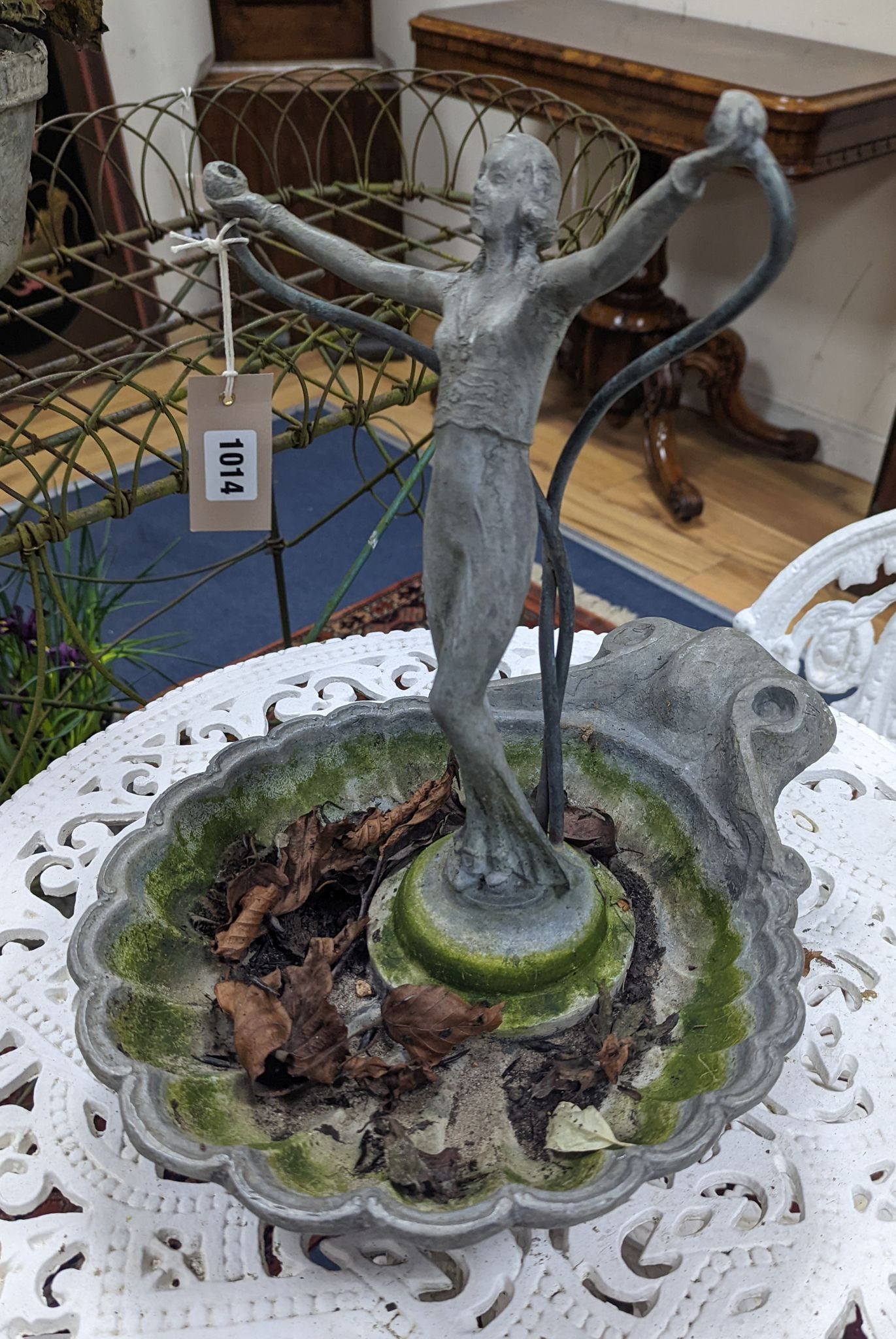 A lead figure and shell garden fountain head, height 32cm